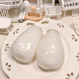 Coconut oil filled white milk bottle moldable and soft squeeze anti-stress squishy toy