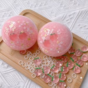 Handmade moldable rice ball with peach charms anti-stress squishy toy